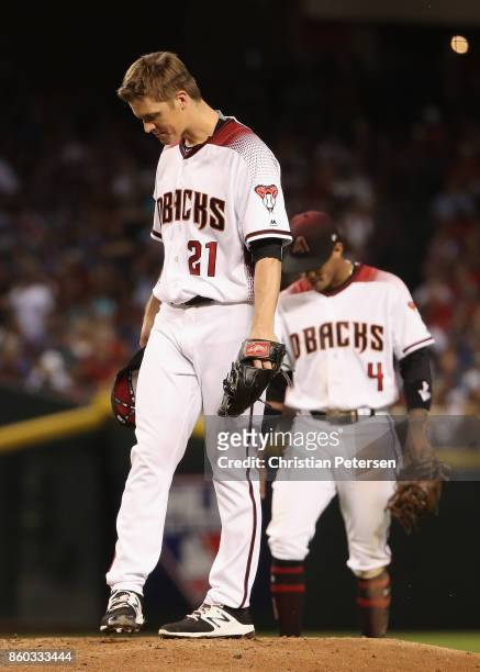 Starting pitcher Zack Greinke of the Arizona Diamondbacks reacts on the mound during the National League Divisional Series game three against the Los...
