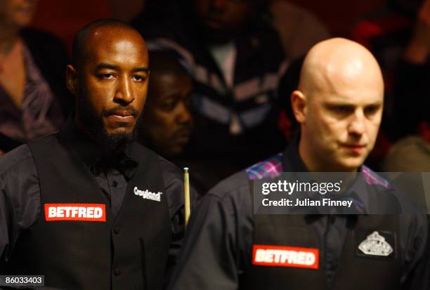 Rory McLeod of England looks on in his first round match against Mark King of England during the Betfred World Snooker Championships at the Crucible...