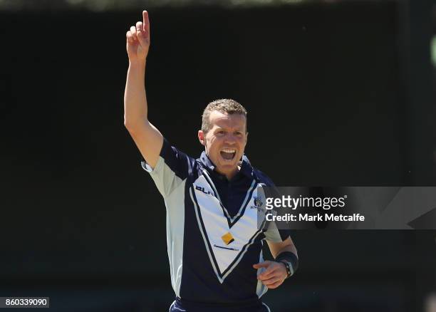Peter Siddle of the Bushrangers celebrates taking the wicket of Tom Cooper of the Redbacks during the JLT One Day Cup match between Victoria and...