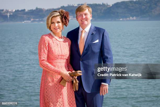 Queen Maxima of The Netherlands and King Willem-Alexander of The Netherlands pose at the Taag on October 11, 2017 in Lisboa CDP, Portugal.