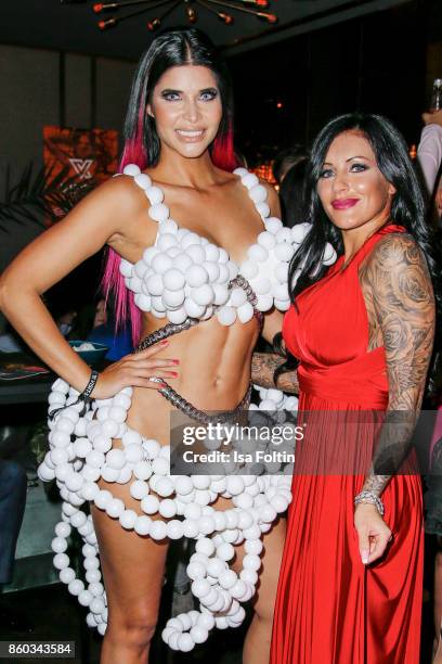 Model Micaela Schaefer and German singer Julia Jasmin Ruehle alias JJ attends the 'Nights of The Nights' event at Amano Grand Central on October 11,...