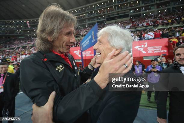 Ricardo Gareca coach of Peru greets Jose Pekerman coach of Colombia prior to a match between Peru and Colombia as part of FIFA 2018 World Cup...