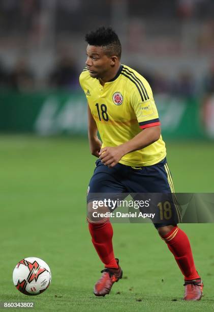 Frank Fabra of Colombia drives the ball during a match between Peru and Colombia as part of FIFA 2018 World Cup Qualifiers at Monumental Stadium on...