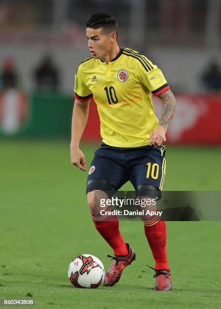 James Rodriguez of Colombia drives the ball during a match between Peru and Colombia as part of FIFA 2018 World Cup Qualifiers at Monumental Stadium...