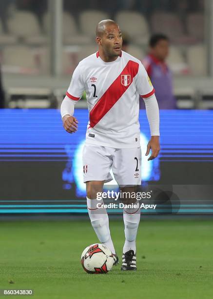Alberto Rodriguez of Peru drives the ball during a match between Peru and Colombia as part of FIFA 2018 World Cup Qualifiers at Monumental Stadium on...