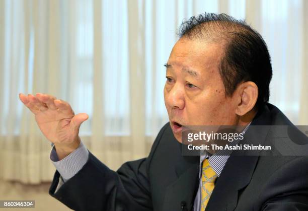 Ruling Liberal Democratic Party Secretary General Toshihiro Nikai speaks during the Asahi Shimbun interview at the LDP headquarters on October 11,...