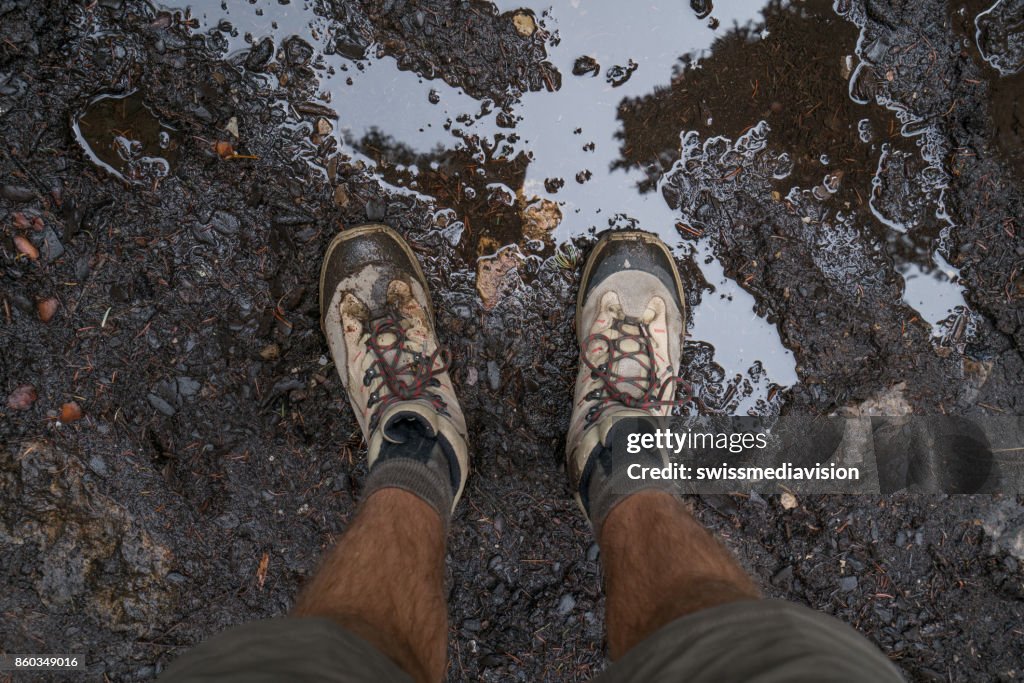 Personal perspective of man hiker on mountain trail