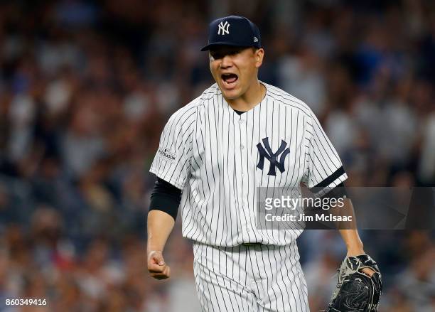 Masahiro Tanaka of the New York Yankees in action against the Cleveland Indians in Game Three of the American League Divisional Series at Yankee...