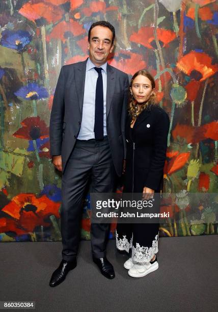 Olivier Sarkozy and Mary-Kate Olsen attend the 2017 Take Home A Nude Art Party and auction at Sotheby's on October 11, 2017 in New York City.