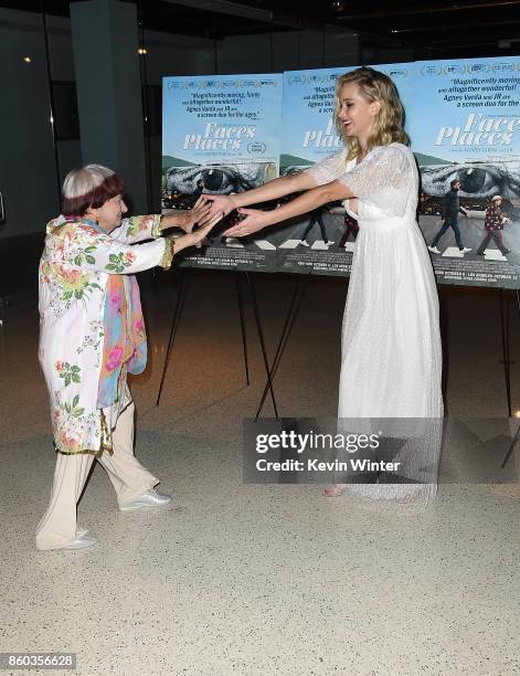 Agnes Varda and Jennifer Lawrence attend the premiere of Cohen Media Group's "Faces Places" at Pacific Design Center on October 11, 2017 in West...