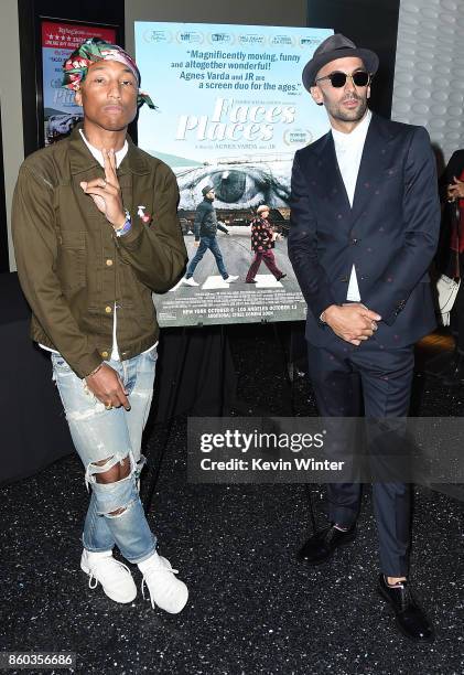 Pharrell Williams and JR attend the premiere of Cohen Media Group's "Faces Places" at Pacific Design Center on October 11, 2017 in West Hollywood,...