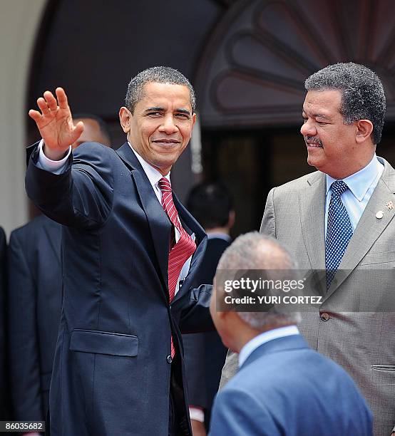 President Barack Obama says good bye next to Dominican Republic's President Leonel Fernandez and Trinidad & Tobago's Prime Minister Patrick Manning...