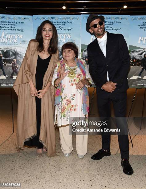 Actress Angelina Jolie and directors Agnes Varda and JR attend the premiere of Cohen Media Group's "Faces Places" at the Pacific Design Center on...