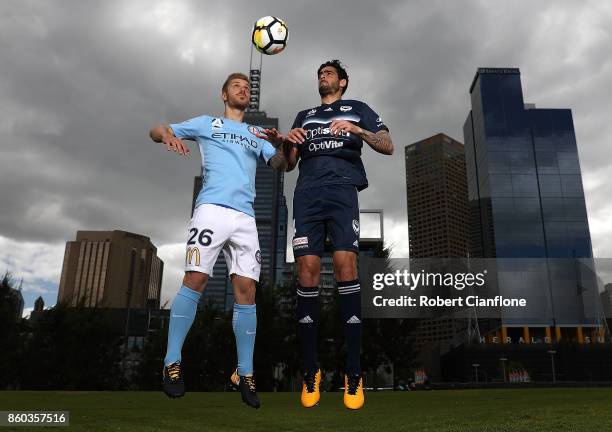 Luke Brattan of Melbourne City and Rhys Williams of Melbourne Victory pose during a Melbourne A-League Derby Media Opportunity at Birrarung Mar on...