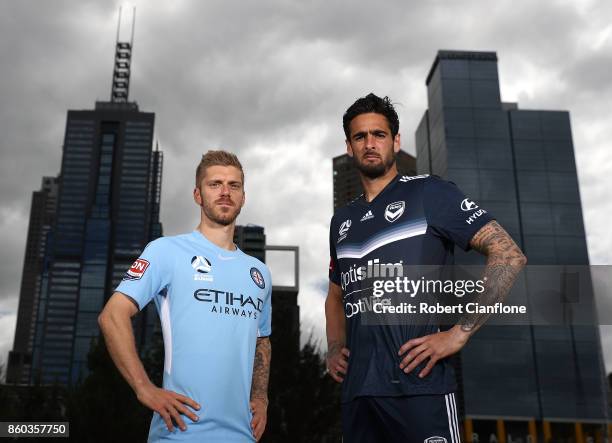 Luke Brattan of Melbourne City and Rhys Williams of Melbourne Victory pose during a Melbourne A-League Derby Media Opportunity at Birrarung Mar on...