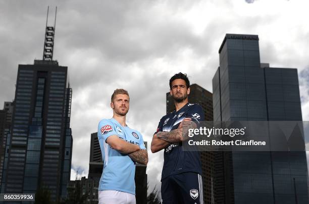 Luke Brattan of Melbourne City and Rhys Williams of Melbourne Victory pose during a Melbourne A-League Derby Media Opportunity at Birrarung Mar on...