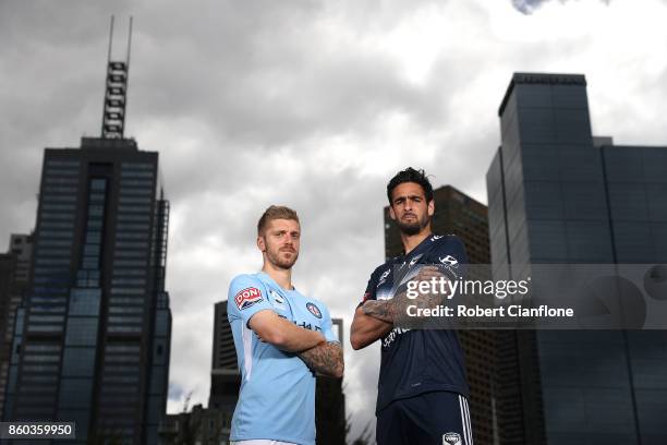 Luke Brattan of Melbourne City and Rhys Williams of Melbourne Victory pose during a Melbourne A-League Derby Media Opportunity at Birrarung Mar on...