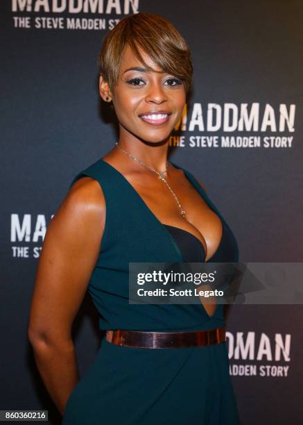 Actress Erica Peeples poses on red carpet during movie premiere at the Michigan Theater on October 11, 2017 in Ann Arbor, Michigan.