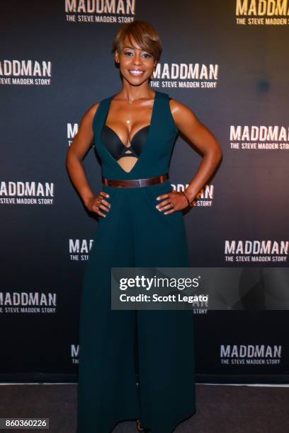 Actress Erica Peeples poses on red carpet during movie premiere at the Michigan Theater on October 11, 2017 in Ann Arbor, Michigan.