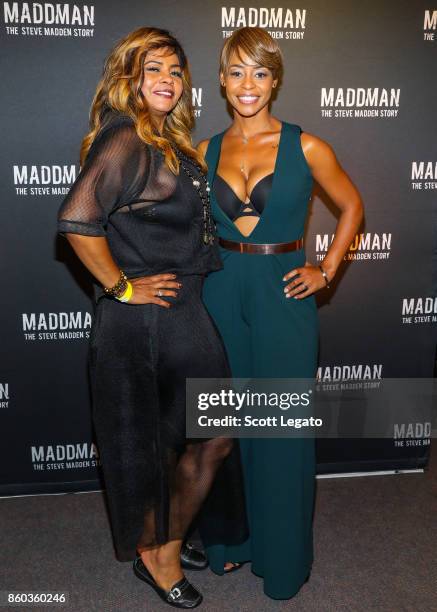 AnnDera Peeples and Actress Erica Peeples pose on red carpet during movie premiere at the Michigan Theater on October 11, 2017 in Ann Arbor, Michigan.