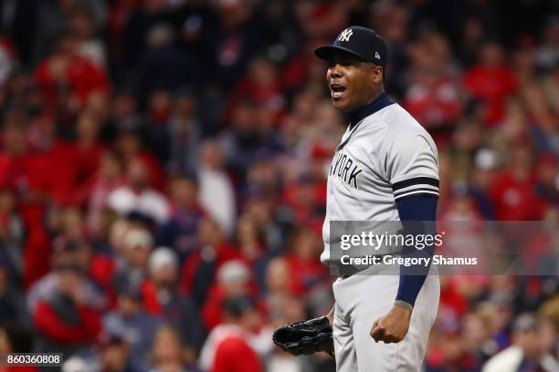 Aroldis Chapman of the New York Yankees celebrates their 5 to 2 win over the Cleveland Indians in Game Five of the American League Divisional Series...