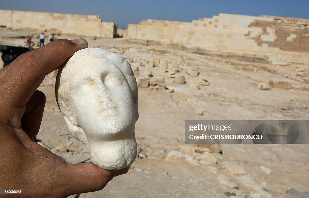 An alabaster statue of Cleopatra is show