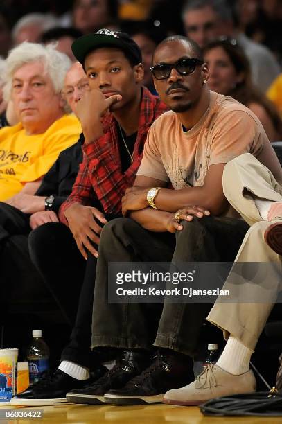 Comedian Eddie Murphy and son sit courtside during the Los Angeles Lakers and Utah Jazz Game One of the Western Conference Quarterfinals during the...