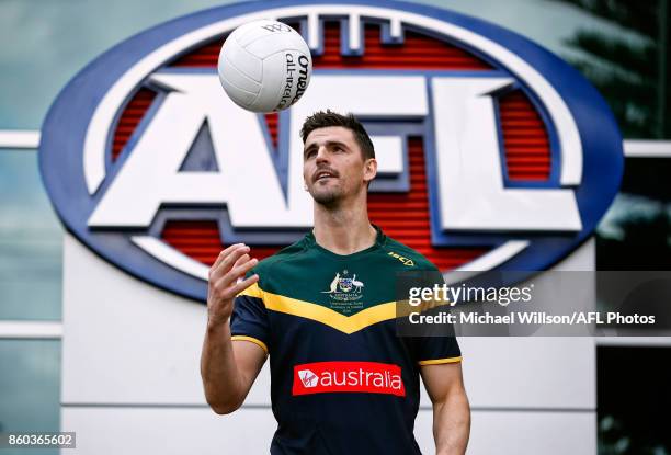 Scott Pendlebury poses for a photograph during the Australian International Rules Series Team Announcement at AFL House on October 12, 2017 in...