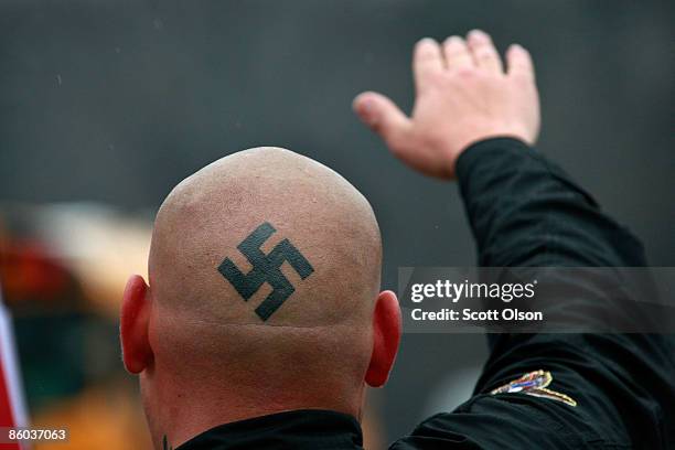 Neo-Nazi protestors organized by the National Socialist Movement demonstrate near where the grand opening ceremonies were held for the Illinois...