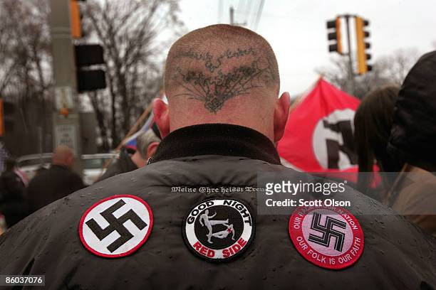 Neo-Nazi protestors organized by the National Socialist Movement demonstrate near where the grand opening ceremonies were held for the Illinois...