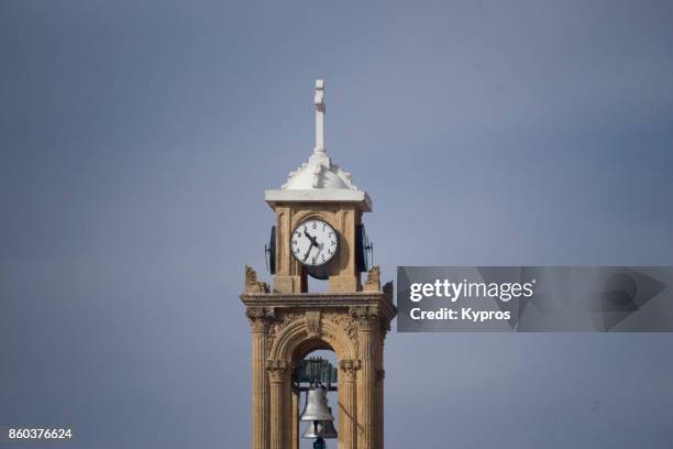 2017 - europe, greece, cyprus, troodos, gerakies village, view of church bell tower clock tower - agios georgios greek orthodox church - agios georgios church stock-fotos und bilder