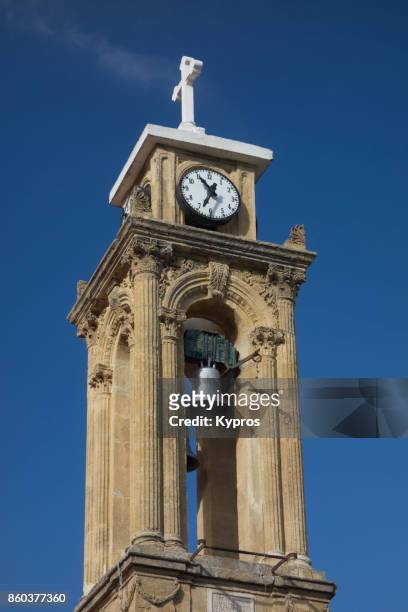 2017 - europe, greece, cyprus, troodos, gerakies village, view of church cross bell tower clock tower - agios georgios greek orthodox church - agios georgios church stock pictures, royalty-free photos & images