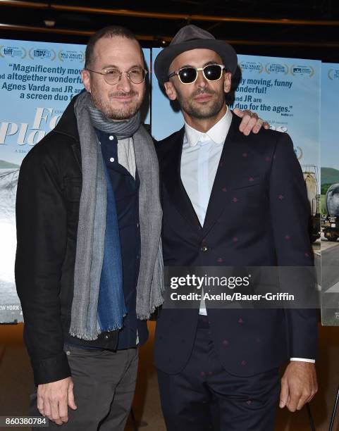 Filmmaker Darren Aronofsky and director JR attend the premiere of Cohen Media Group's 'Faces Places' at the Pacific Design Center on October 11, 2017...