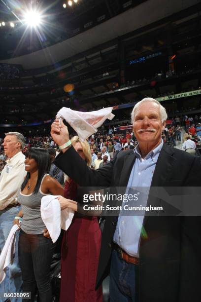 Ted Turner, former owner of the Atlanta Hawks cheers before the game against the Miami Heat in Game One of the Eastern Conference Quarterfinals...