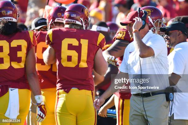 Head Coach Clay Helton congratulates USC Jake Olson after appearing in a college football game between the Oregon State Beavers and the USC Trojans...