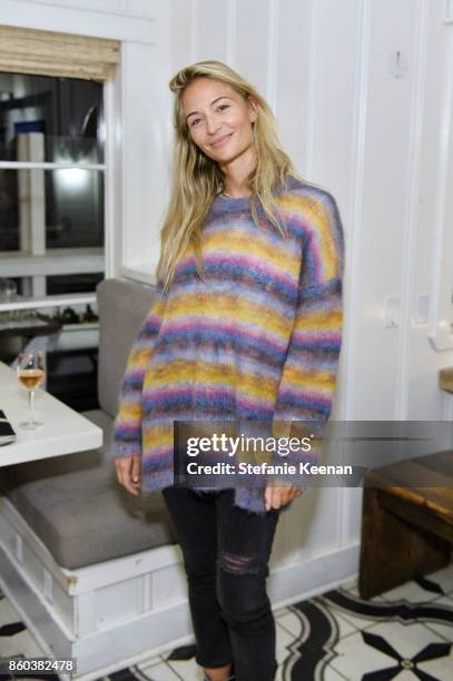 Ambre Dahan attends Jenni Kayne Home Collection Launch at Malibu Farm on October 11, 2017 in Malibu, California.