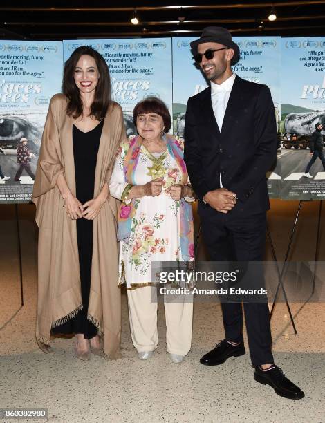 Actress Angelina Jolie and directors Agnes Varda and JR attend the premiere of Cohen Media Group's "Faces Places" at the Pacific Design Center on...