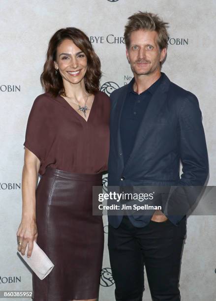 Actors Annie Parisse and Paul Sparks attend the "Good Bye Christopher Robin" New York special screening at The New York Public Library on October 11,...