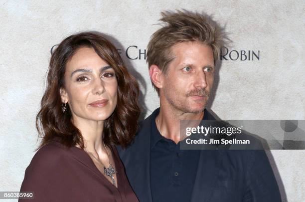 Actors Annie Parisse and Paul Sparks attend the "Good Bye Christopher Robin" New York special screening at The New York Public Library on October 11,...