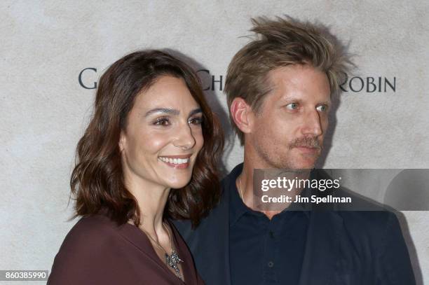 Actors Annie Parisse and Paul Sparks attend the "Good Bye Christopher Robin" New York special screening at The New York Public Library on October 11,...