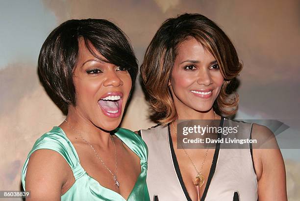 Actresses Wendy Raquel Robinson and Halle Berry attend the Jenesse Silver Rose Gala and Auction at the Beverly Hills Hotel on April 19, 2009 in...