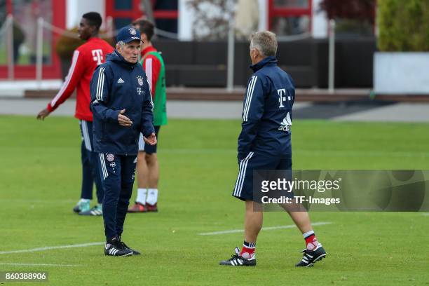 Head coach Jupp Heynckes of Bayern Muenchen speak with Co-coach Peter Hermann of Bayern Muenchen diskussion during a training session at the FC...