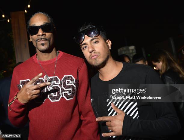 Host Snoop Dogg and guest attend TBS' Drop the Mic and The Joker's Wild Premiere Party at Dream Hotel on October 11, 2017 in Hollywood, California....