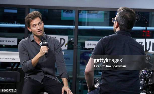 Singer Peter Cincotti and moderator Matt Forte attend Build to perform "Long Way From Home" at Build Studio on October 11, 2017 in New York City.