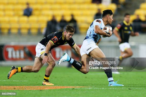 Solomon Alaimalo of Northland attempts to evade Wes Goosen of Wellington during the round nine Mitre 10 Cup match between Wellington and Northland at...