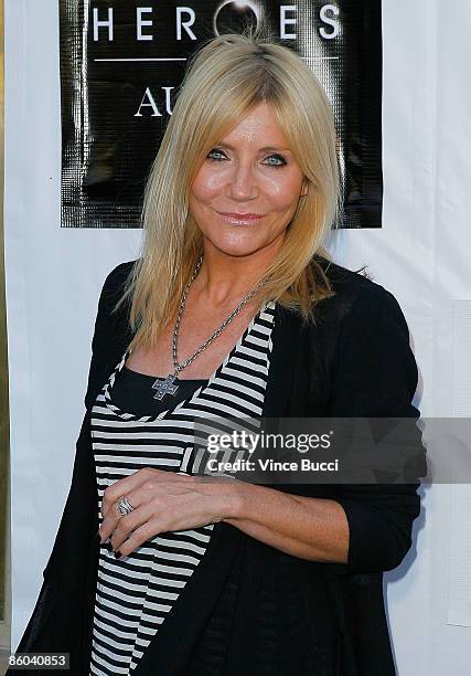 Actress Michelle Collins attends the "Heroes For Autism" charity auction and concert benefitting Austism Speaks on April 19, 2009 in Los Angeles,...