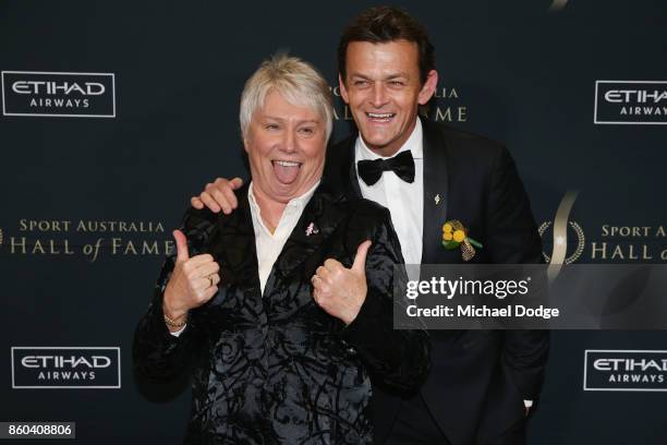 Raelene Boyle poses with Adam Gilchrist at the Sport Australia Hall of Fame Annual Induction and Awards Gala Dinner at Crown Palladium on October 12,...