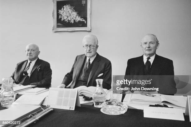 Notice councilors committees Cyril Radcliffe , Manny Shinwell and Selwyn Lloyd at the Cabinet Office, Whitehall, London, UK, 14th March 1967.