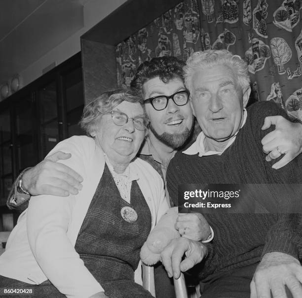 Australian entertainer Rolf Harris with his parents Agnes and Cromwell, Southampton, 6th April 1967.