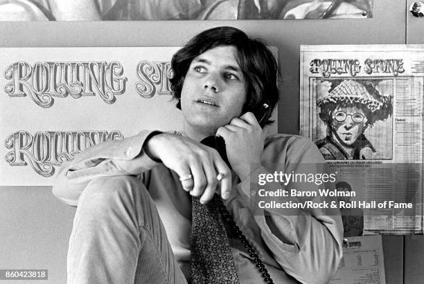 Jann Wenner, founder and publisher of Rolling Stone magazine, on the phone in the magazine's offices in San Francisco, 1968.